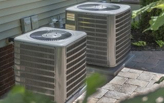two air conditioners side by side